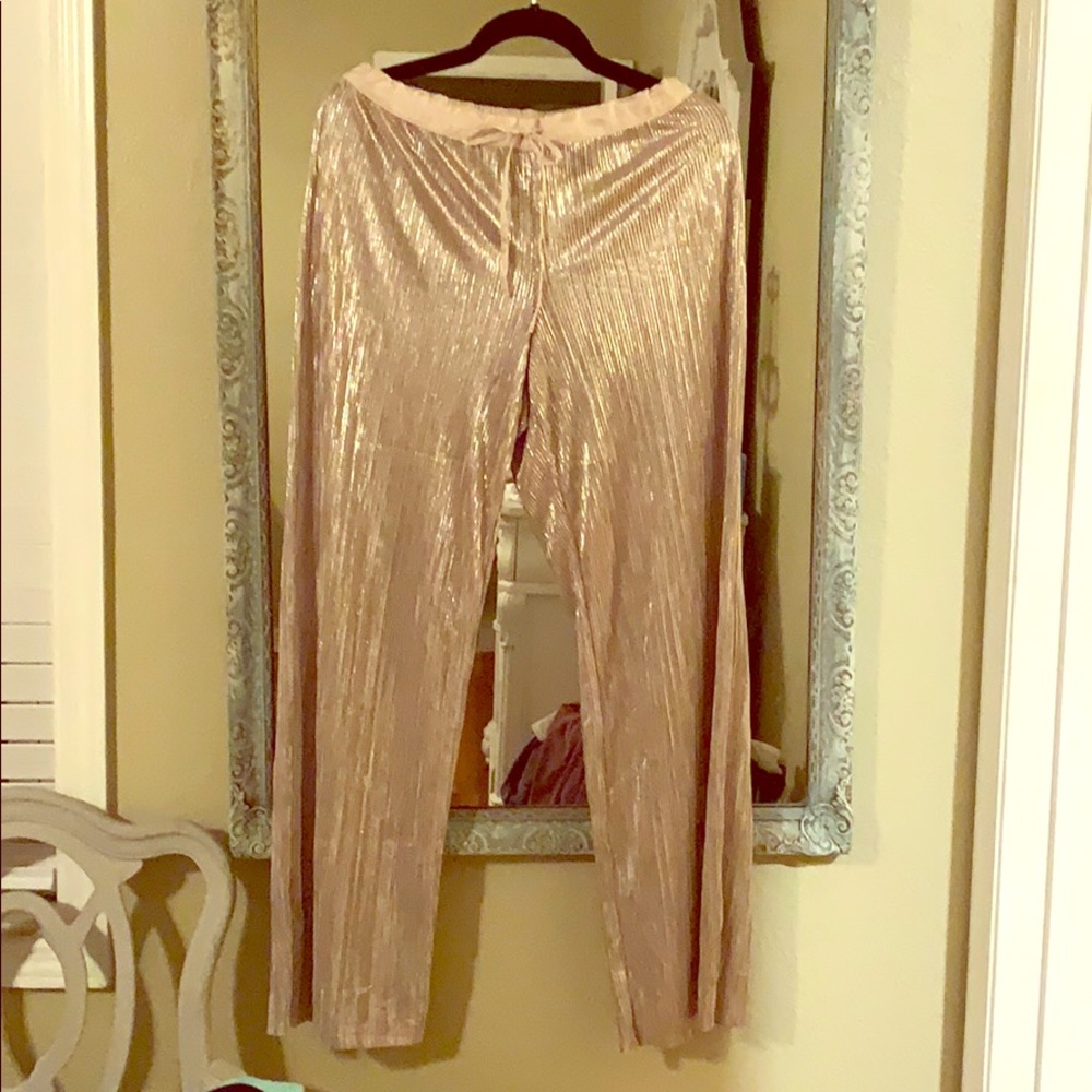 VS Women’s gold shimmering lounge bottoms. Size M